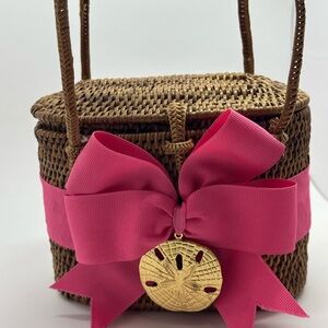 Woven Rattan Crossbody Bag with Pink Bow and Gold Sand Dollar Charm